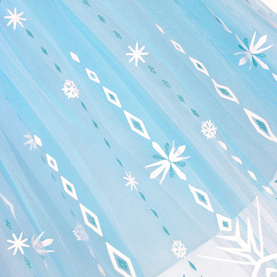 hemline detail of layered blue mesh skirt